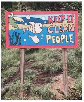An image of a sign the children created stating "Keep it Clean People"